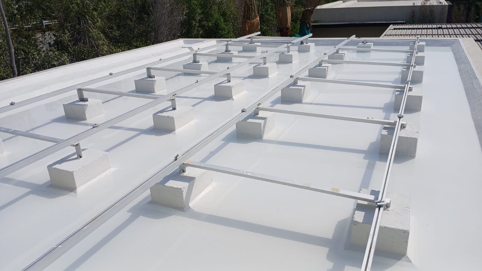 Roof finished in a white waterproofing coat